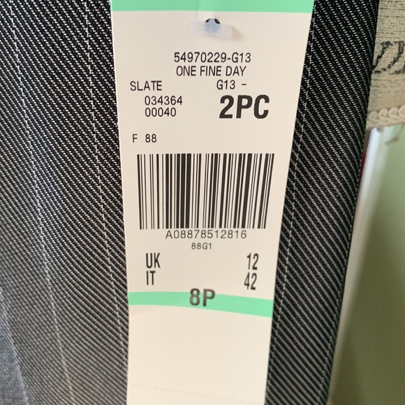 Beautiful pinstripe suit, BNWT, purchased from Macy’s, Size 8P, Color is slate. - Picture 7 of 16